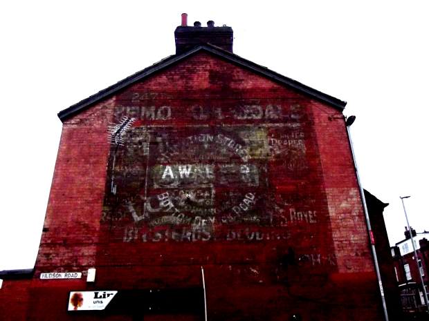 This ghost sign seems a little confused about its true self
